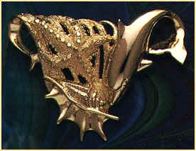 14K gold dolphin, starfish, and shell omega slider