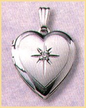 14K white gold heart locket with a one point diamond