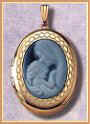 14K gold cameo locket in oval shape with mother and child